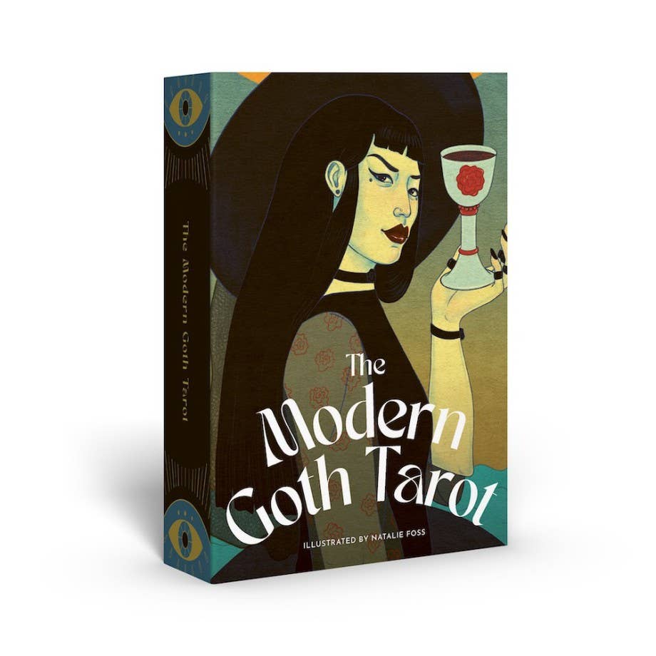 Book cover of 'The Modern Goth Tarot' with a stylized illustration of a woman holding a drink.