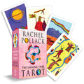 The Shining Tribe Tarot deck by Rachel Pollack, showing the pink card box in front of several illustrated tarot cards on a clean white background.