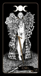 Tarot card featuring a figure labeled 'Justice' with floral elements and moon symbols.