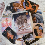 Collection of 'Animal Spirit Oracle' cards on a textured surface