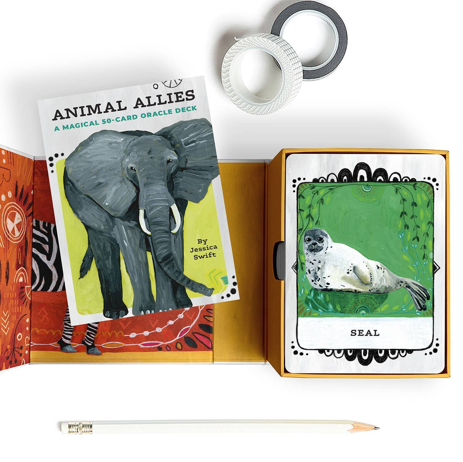 Card deck with elephant illustration and tarot card featuring seal on a white background