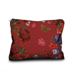 Floral-patterned pouch with red background on a white background