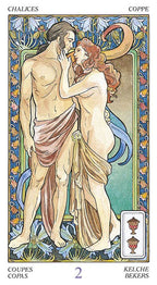 Art Nouveau-style card featuring two figures embracing with decorative elements.