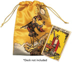 Gold drawstring bag with tarot card design featuring a person on a mountain, next to a tarot card titled 'The Magician'.