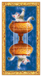 Decorative tile with a cat design on a blue background, framed by gold border.