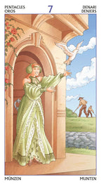 Tarot card featuring a woman in a green dress with doves and a landscape in the background