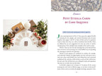 Book page with 'Petit Etteilla Cards' by Card Sequence, featuring cards and decorative items on a white surface.