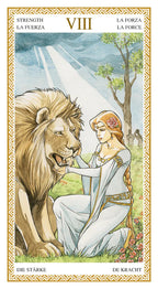 Tarot card featuring a woman and lion with a scenic background