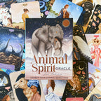 Collection of tarot cards with 'Animal Spirit Oracle' book in the center