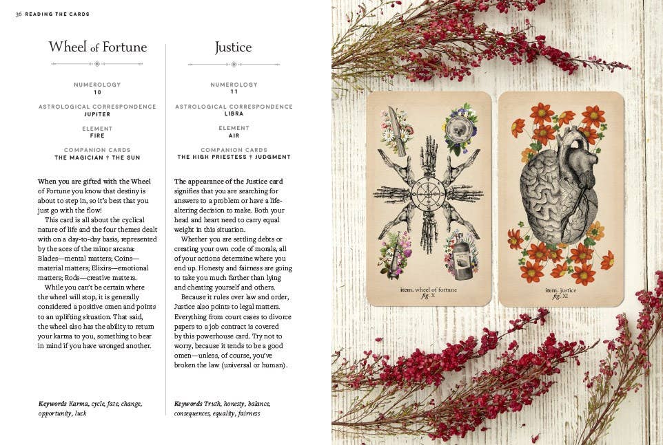 Two tarot cards with decorative elements on a textured surface