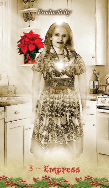 A sepia-toned vintage-style illustration of a woman in a floral dress standing in a kitchen, with the text 'Productivity' at the top and '3 ~ Empress' at the bottom. A red poinsettia and green holly decorate the scene.