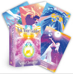 Set of 'Ask Your Guides' oracle cards by Sonia Choquette with colorful designs and a guidebook.