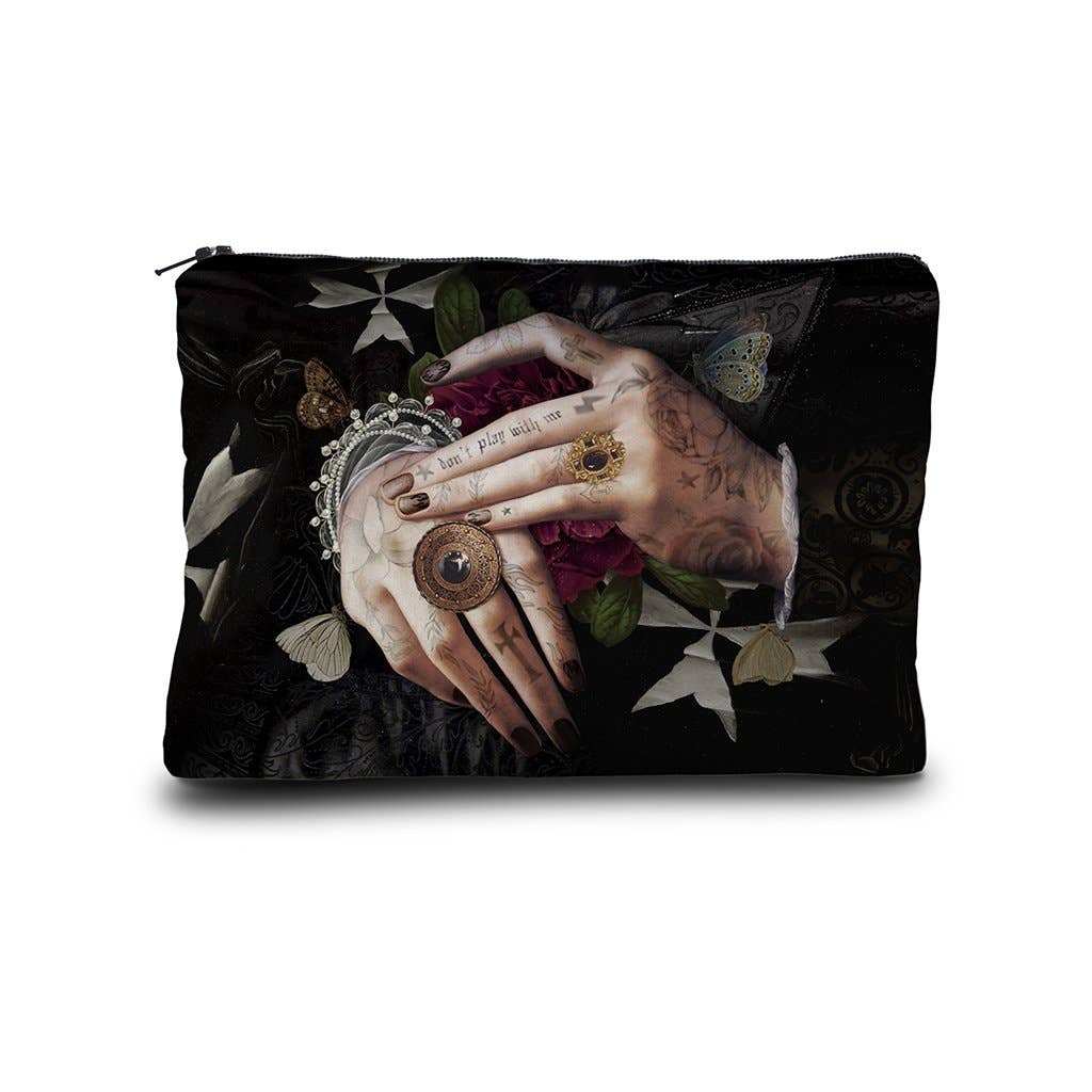 Black pouch with tattooed hands and floral design on a white background