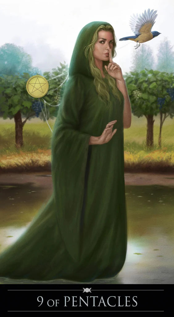 Tarot card featuring a person in a green hooded cloak with a pentacle symbol, standing in a natural setting.