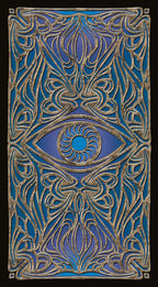 Decorative panel with eye design and intricate patterns on a blue and gold background