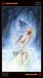 Tarot card featuring a woman in a white dress with a wolf in a mystical landscape