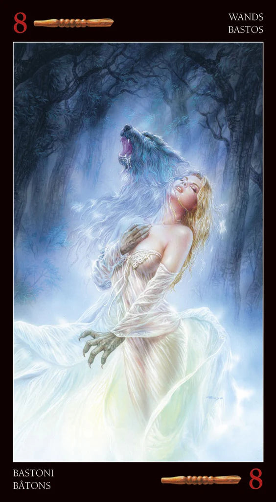 Tarot card featuring a woman in a white dress with a wolf in a mystical landscape