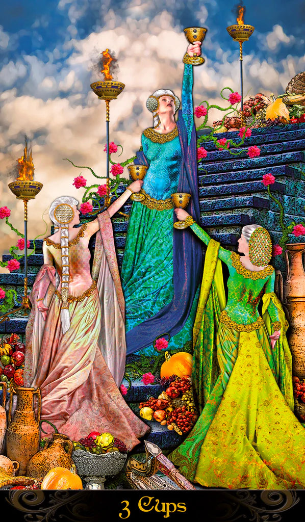 Three women in colorful robes standing in a mystical setting with flowers and fruits, labeled '3 Cups'.