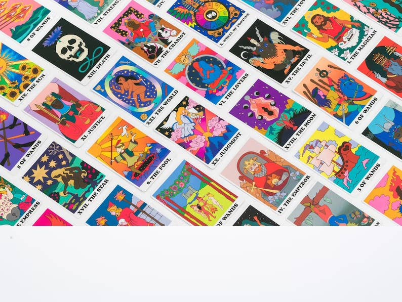 Collection of colorful tarot cards arranged in a grid on a white background