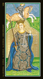 Justice Card VIII from a tarot deck featuring a woman with a sword and scale, and a knight on a horse in the background.