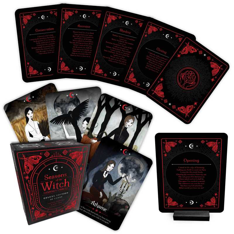 Witch-themed tarot deck set with the box, multiple illustrated cards fanned out, and a standalone card stand on a white background.