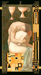 Tarot card featuring a nude figure with a draped cloth, stylized geometric patterns, and text at the top.