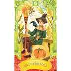 Card featuring a character labeled 'King of Brooms' with a broomstick and pumpkin, surrounded by decorative elements.