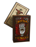 Decorative box with intricate design featuring a hand and eye, on a white background