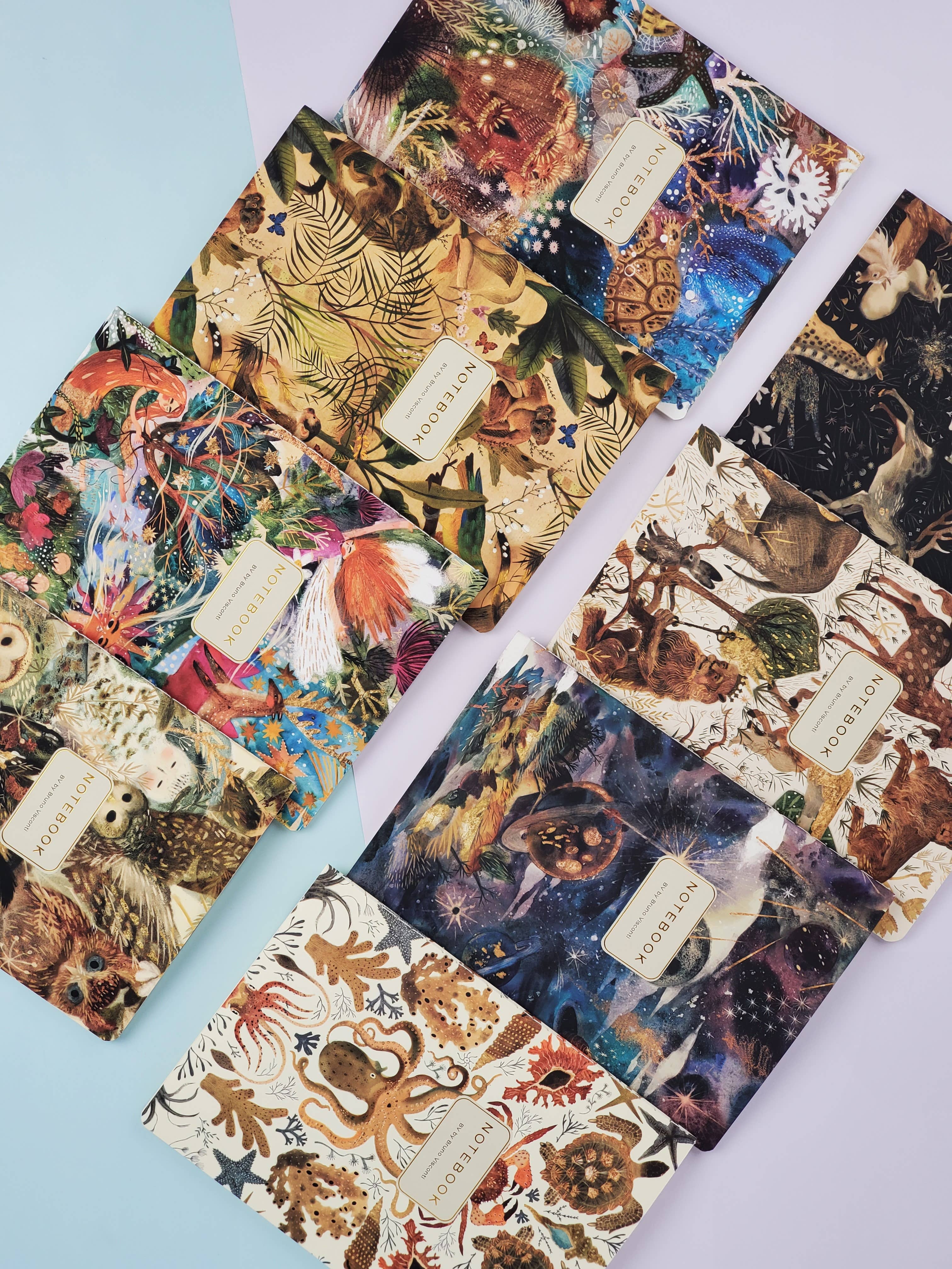 Collection of colorful greeting cards with nature-themed designs on a light blue background.