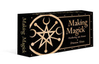 Black box with gold design and text 'Making Magick' on a white background