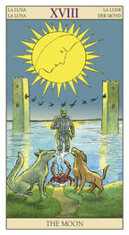 Tarot card titled 'The Moon' with a yellow sun, two wolves, and a figure standing on water.