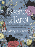 Book cover of 'Essence of Tarot' with tarot cards and floral designs on a blue background.