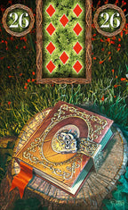 Decorative book with a key on a grassy background featuring card-like designs.
