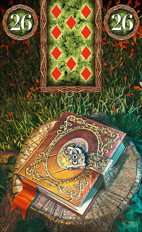 Decorative book with a key on a grassy background featuring card-like designs.