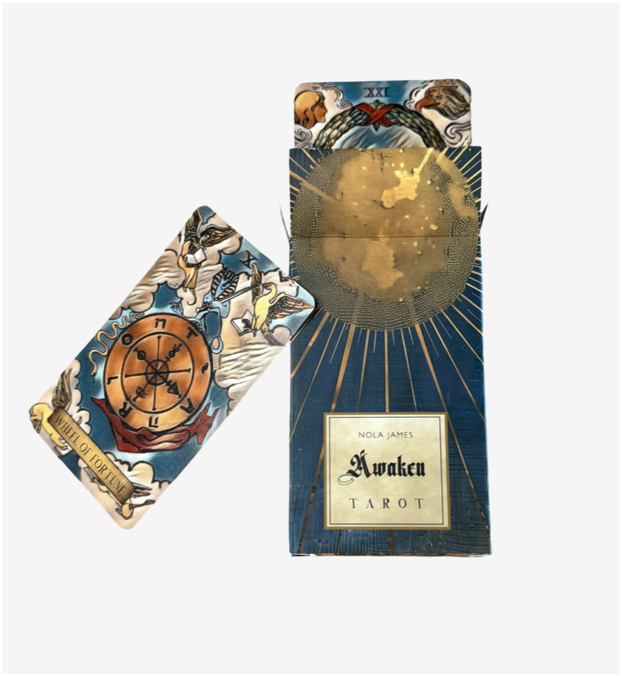 Tarot card set with decorative cover on a white background