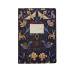Notebook with a colorful animal and floral pattern on a dark blue background