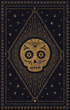 Decorative poster with a gold skull design on a black background