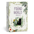 Box of 'The Found World Oracle' with a black cat illustration on a white background