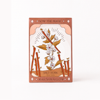A rectangular box of Marshmallow Salt Soak featuring an Art Deco style illustration of a plant with white blossoms, brown leaves, and orange-brown branches on a cream background, with a dusty rose border. The text 'SOW THE MAGIC' is at the top and 'MARSHMALLOW SALT SOAK' is at the bottom.