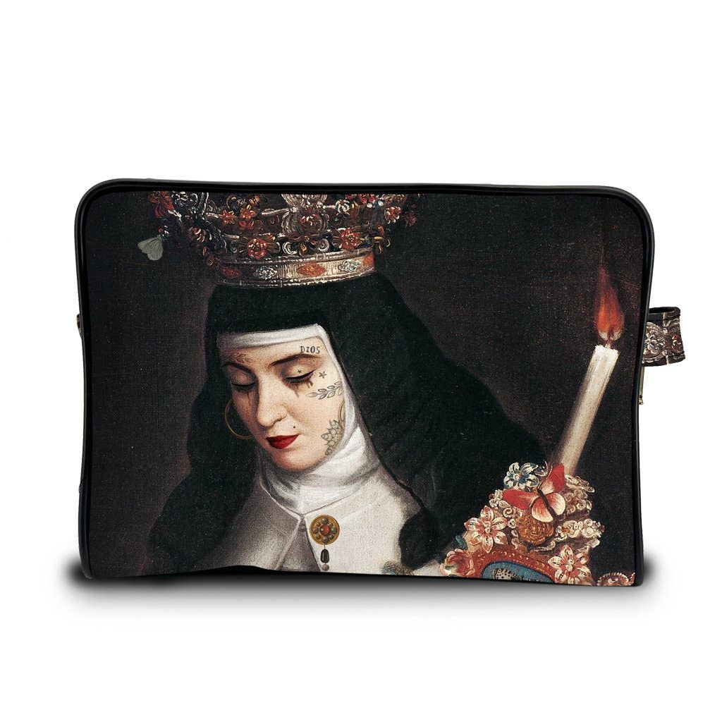 A black zippered toiletry bag featuring a printed reproduction of a historical religious painting of a nun in a crown holding a candle, shown against a plain white background.