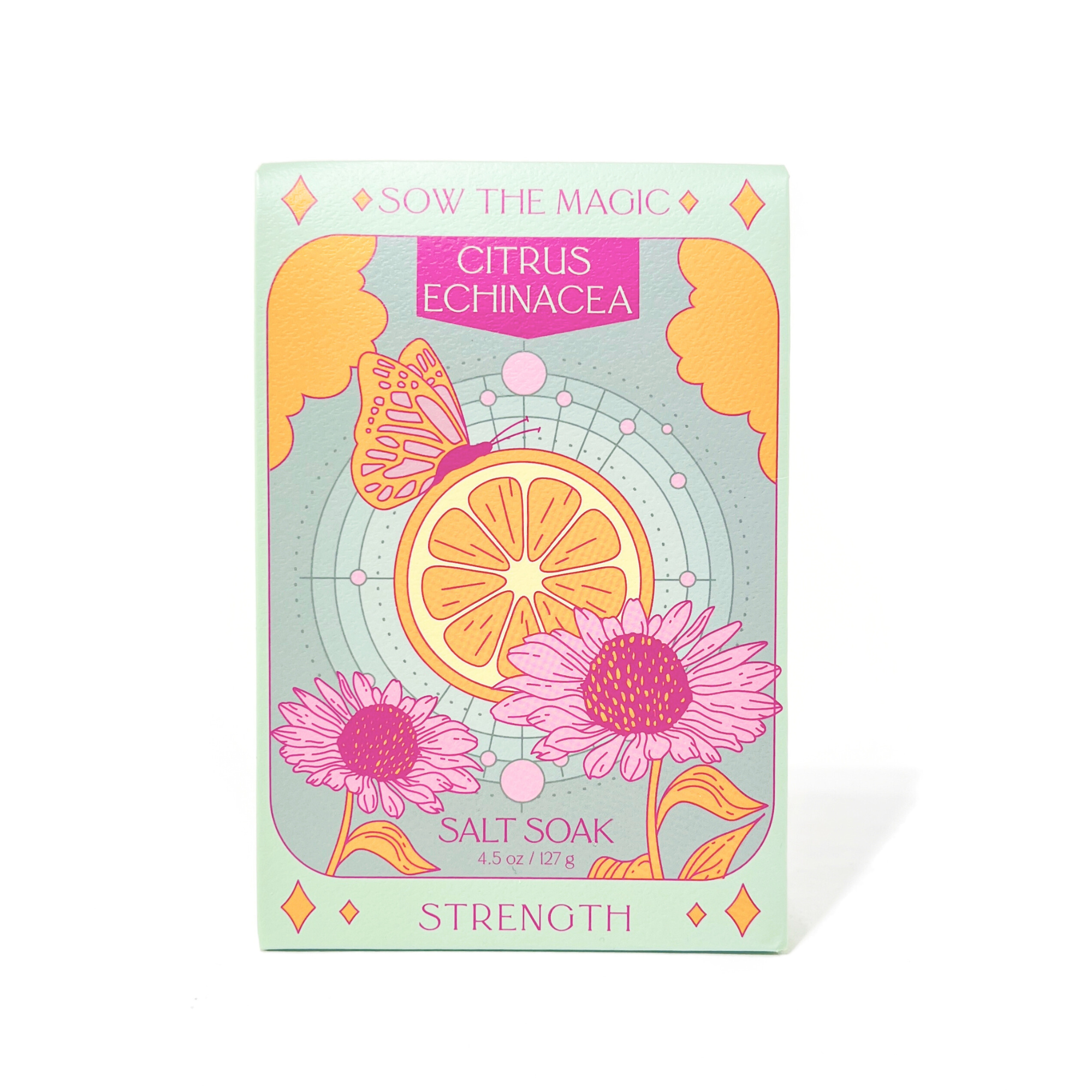 Salt soak packaging with citrus and echinacea design on a light blue background