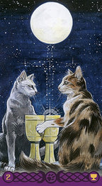 Two cats sitting at a table under a full moon with astrological symbols.