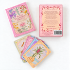 Sow the Magic Plant Guardians Oracle card deck shown with its pink illustrated box, back of the box, and several fanned oracle cards on a white background.