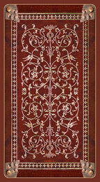 Decorative book cover with intricate patterns and metal accents on a brown background