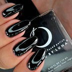 Black nail polish with Luna nail polish bottle