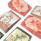 Set of cards with floral and nature-themed designs on a white background