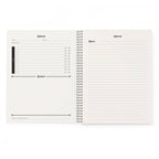 Open notebook with lined pages on a white background