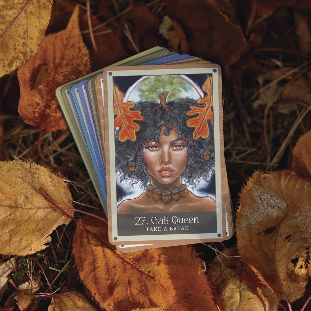 Card featuring a woman with a crown of leaves on a background of autumn leaves
