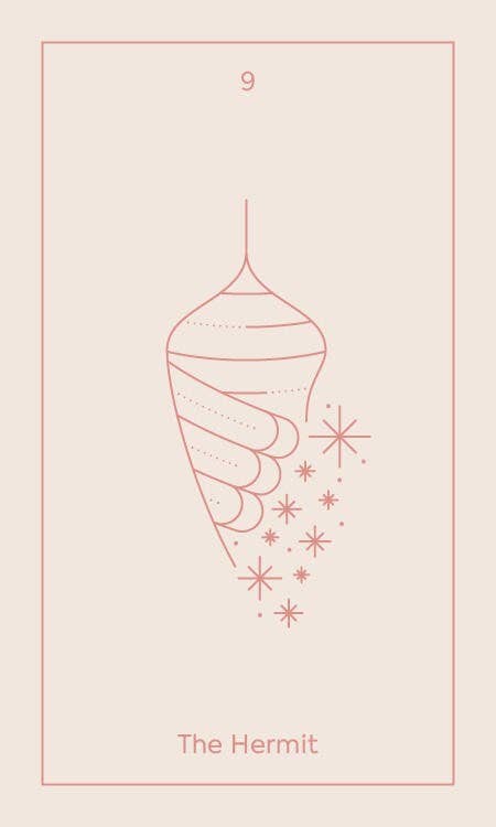 Tarot card featuring 'The Hermit' with a hand holding a lantern on a pink background