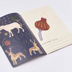 Open notebook with animal illustrations on a white background
